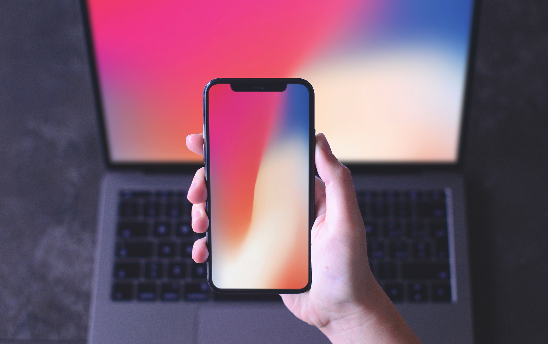 Hand holding iphone mockup