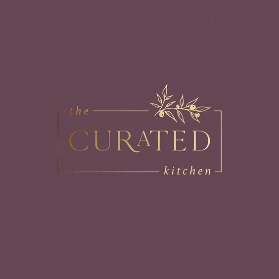 the curated kitchen golden logo 